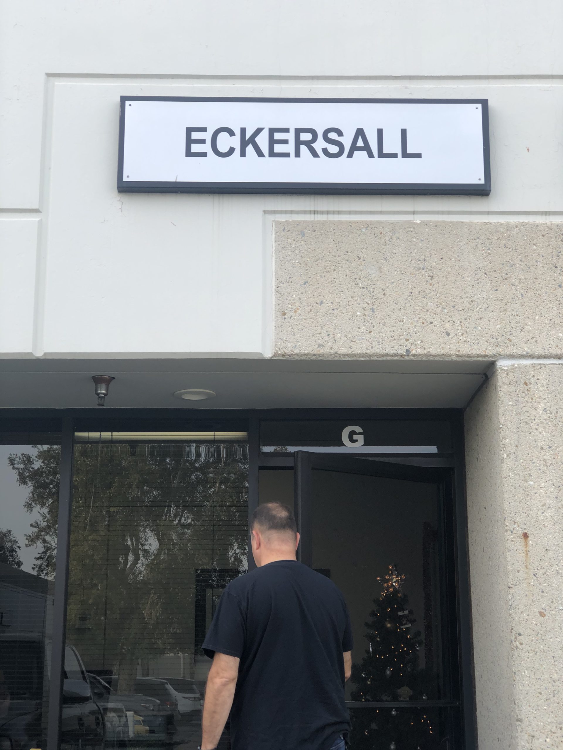 Scott Eckersall opening office door
